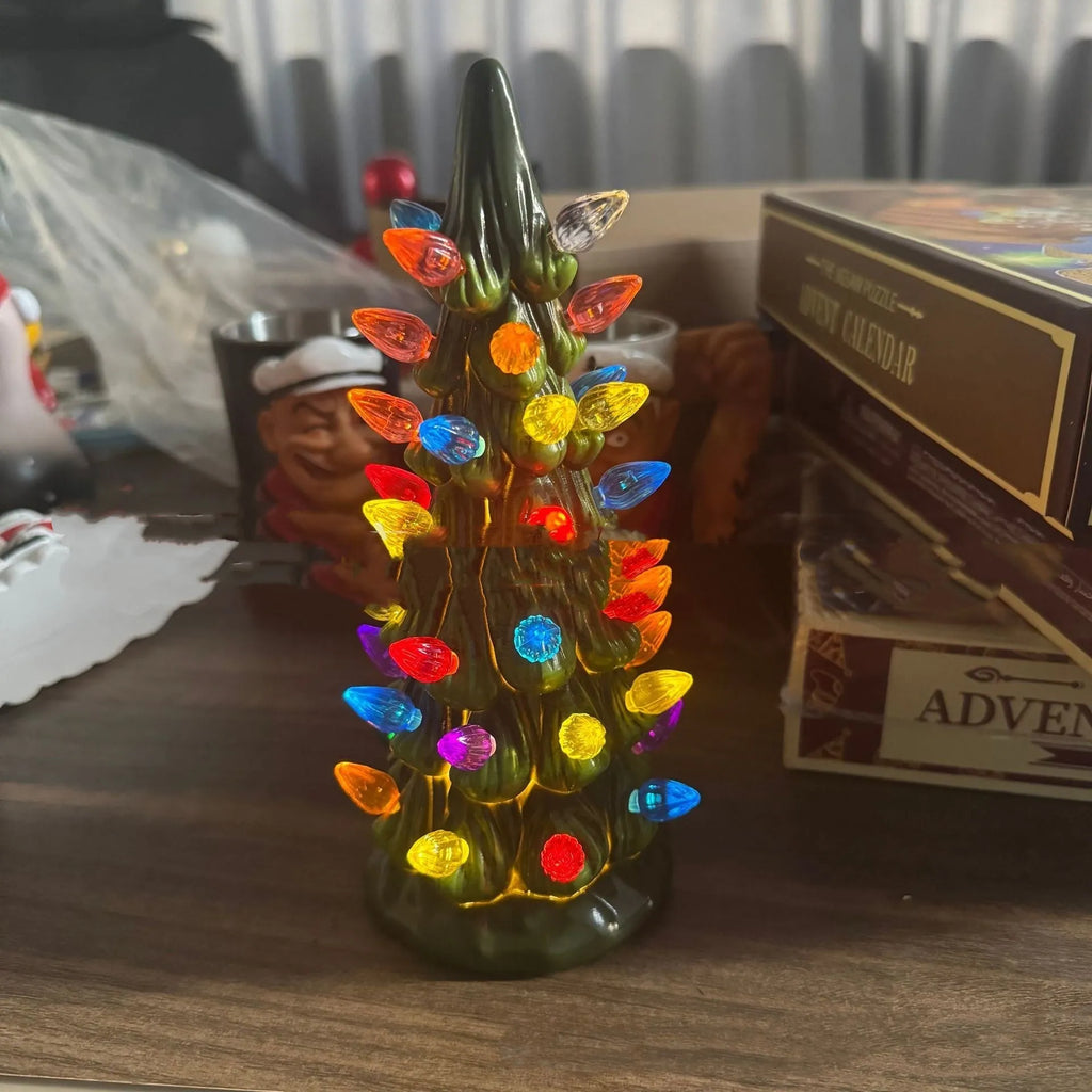Resin Christmas tree decoration with lights in European style, shown in 20cm, 25cm, and 30cm sizes.