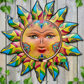Iron sun face metal wall hanging decoration in one of five colour options.