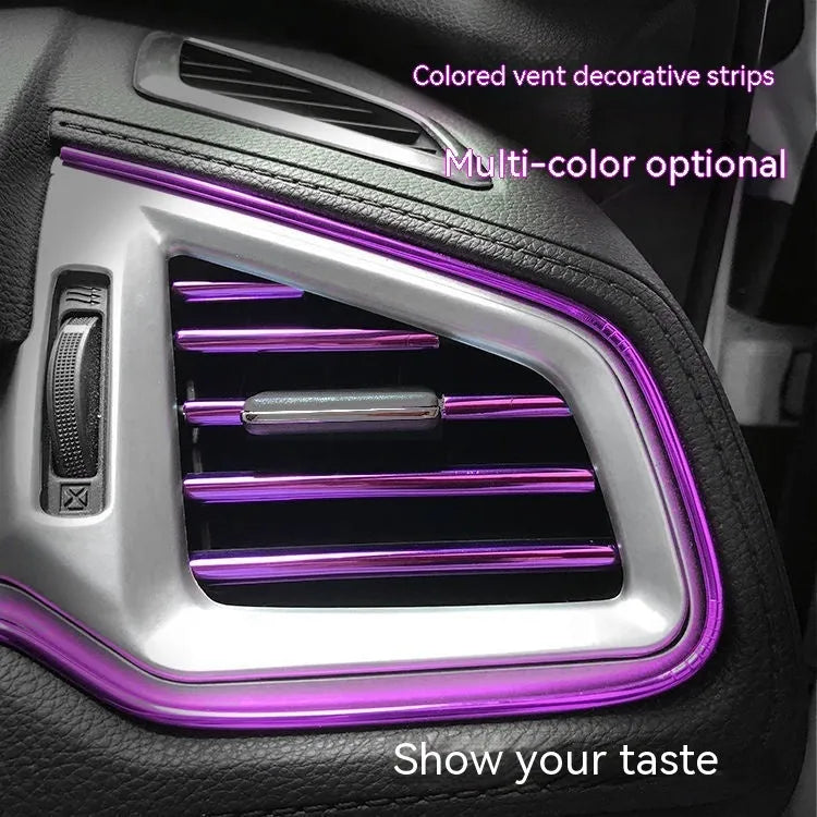 Ten PVC car air conditioning outlet trim clips in assorted colours on a dark dashboard