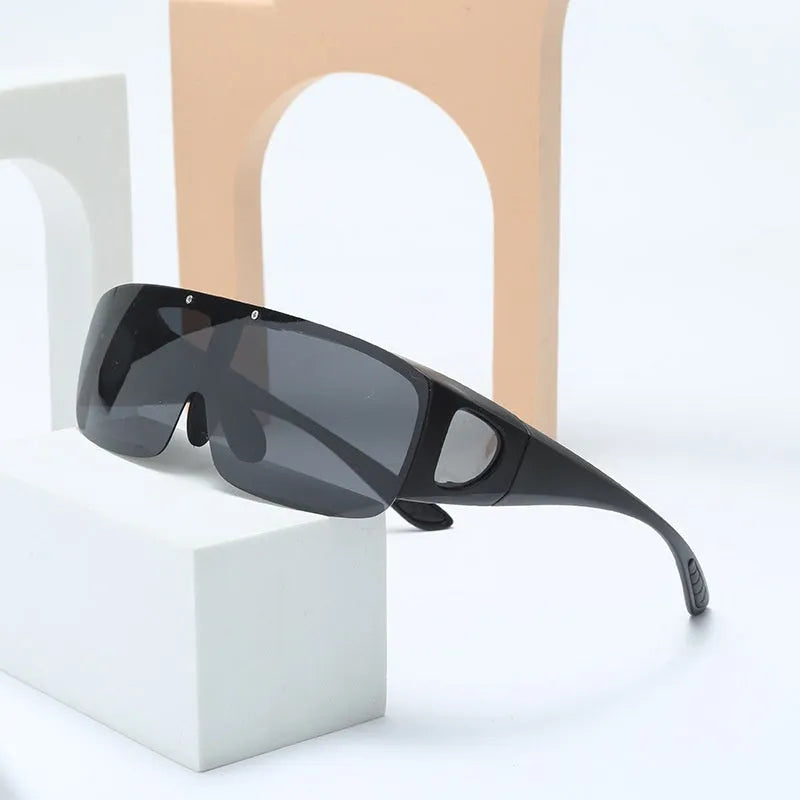 One-piece polarised prescription sunglasses for sports like cycling and climbing, shown in multiple lens colour options.