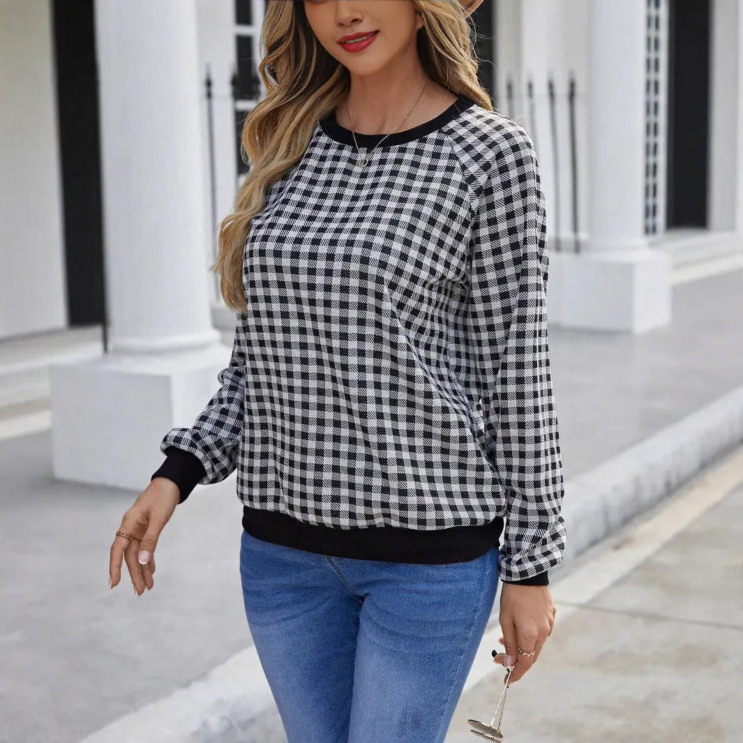 Black men's long sleeve sweater with a striped plaid print pattern.