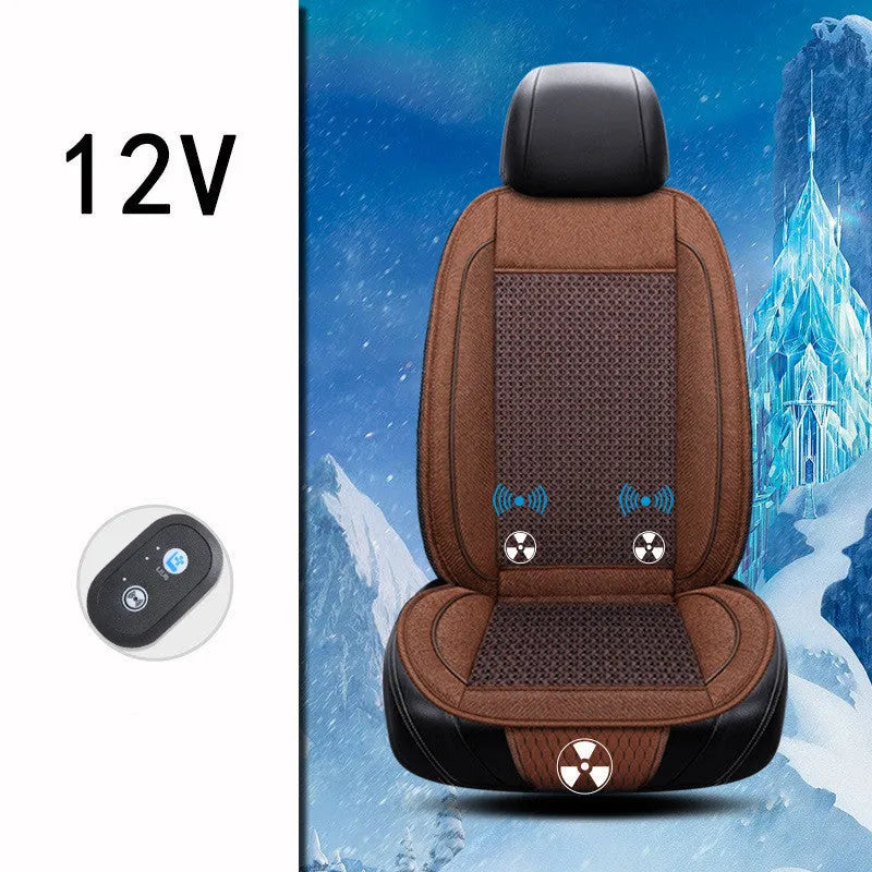 Black minimalist car ventilation seat cushion with power cord on a car seat.