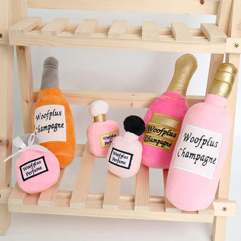 Soft plush dog toy shaped like a colourful wine bottle for gentle chew play.