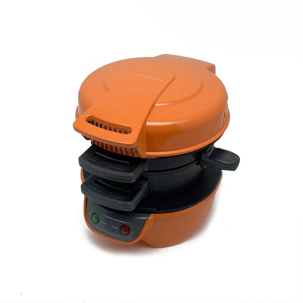 Bright red breakfast machine with sandwich maker and egg cooker ring on kitchen counter