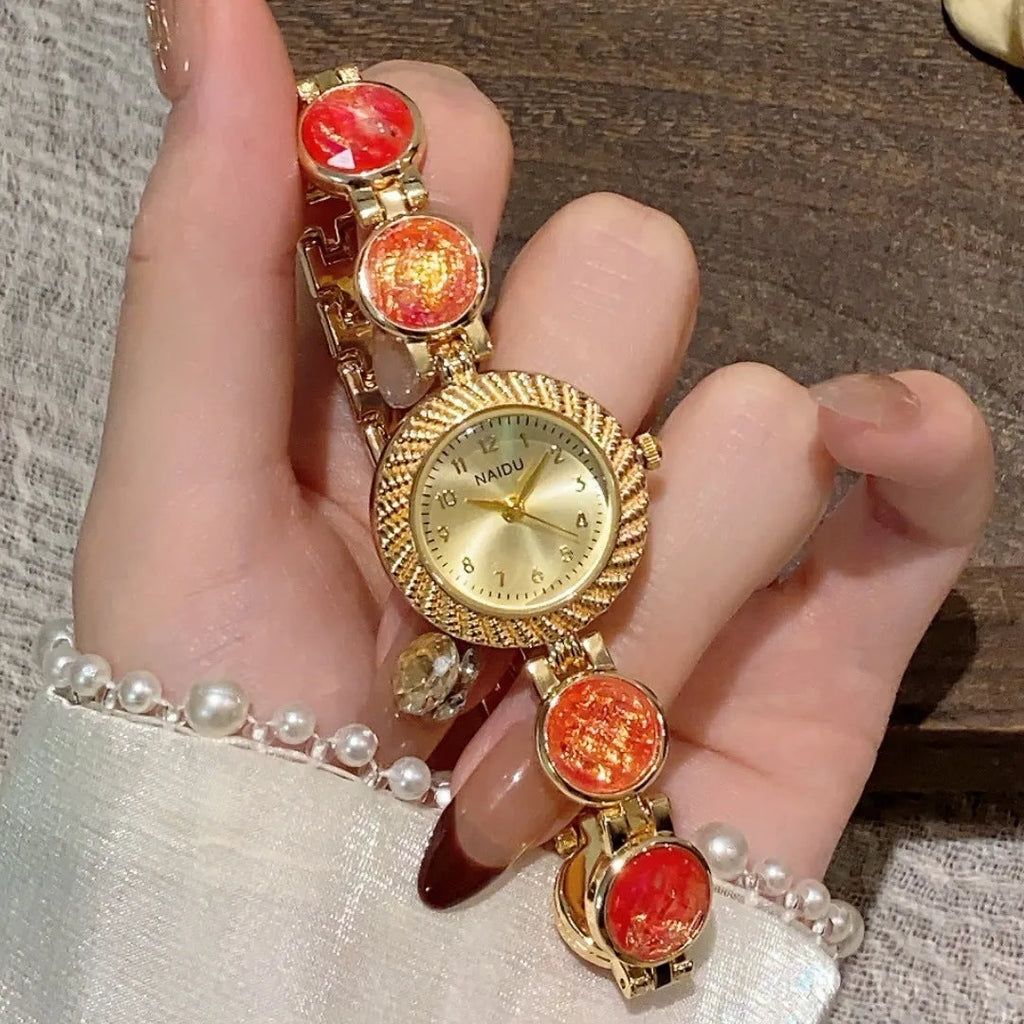 Women's quartz watch with round 25mm dial in one of six colours and zinc alloy case.