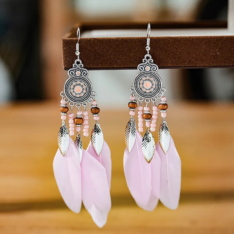 Round drop feather earrings with leaf pattern in alloy metal, available in multiple colours