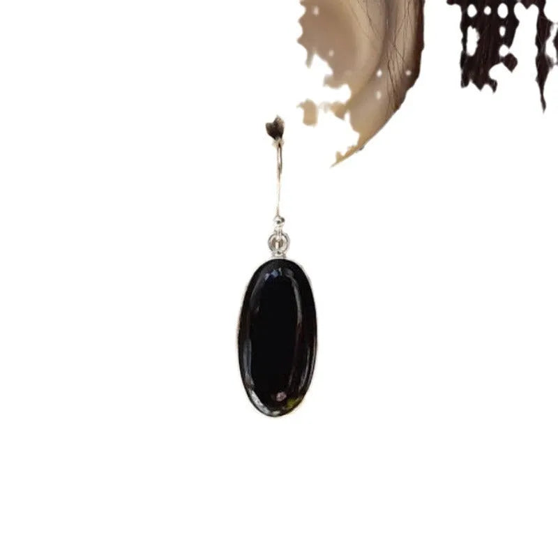 Women's geometric silver earrings with black agate oval pendants on silver chain