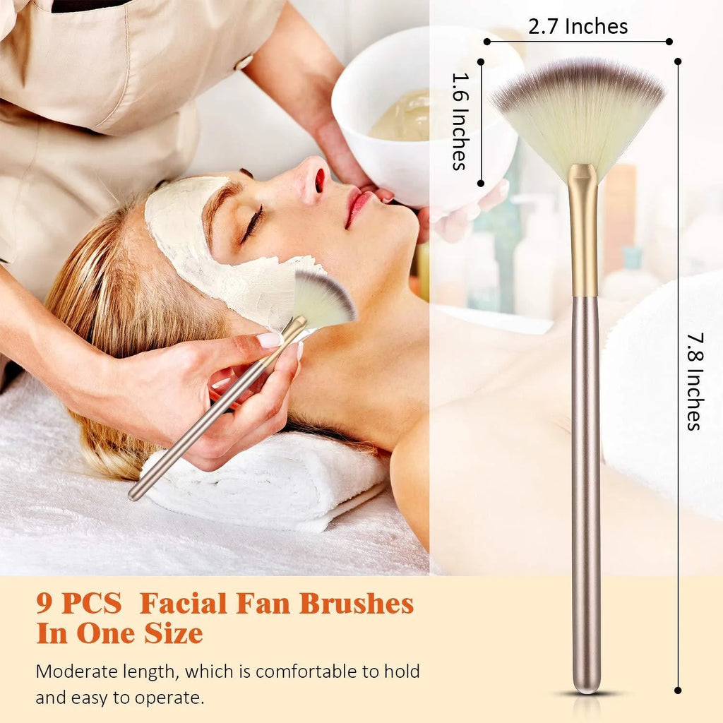 Ten champagne-coloured facial fan brushes with acrylic handles and protective covers