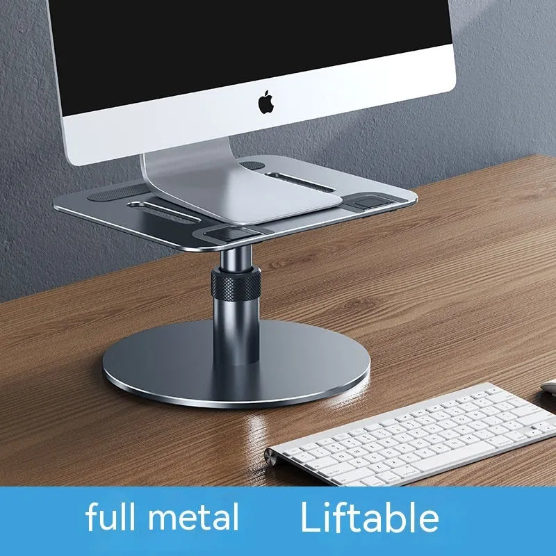 Mobile folding laptop lifting cooling bracket in gray on a desk lifting a silver laptop for airflow