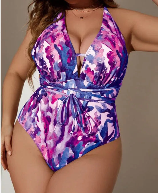 Purple halter neck one-piece swimsuit with bikini style on adult female model