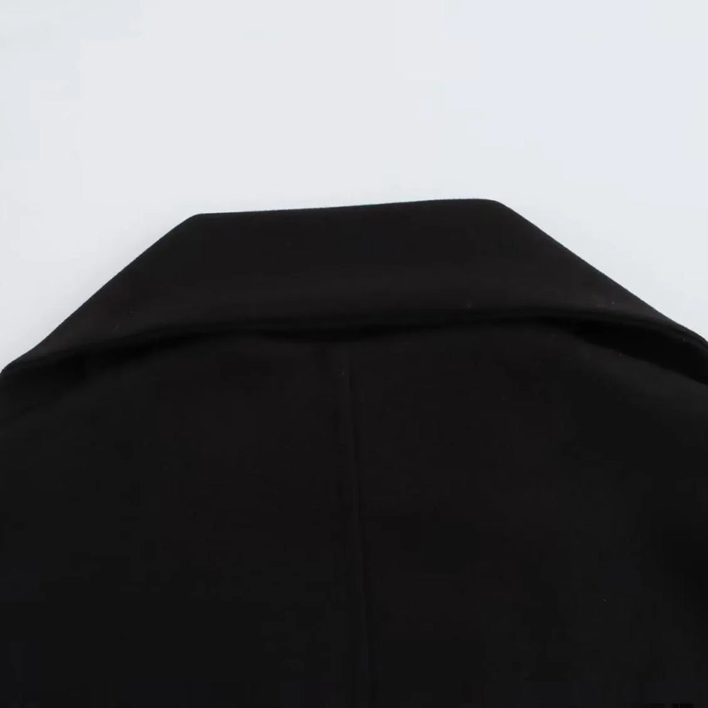 Women's long black polyester overcoat with a grey artificial fur collar, shown at full length.