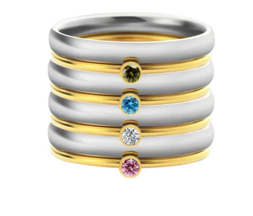 A geometric titanium steel ring engraved with a December birthstone superimposed design.