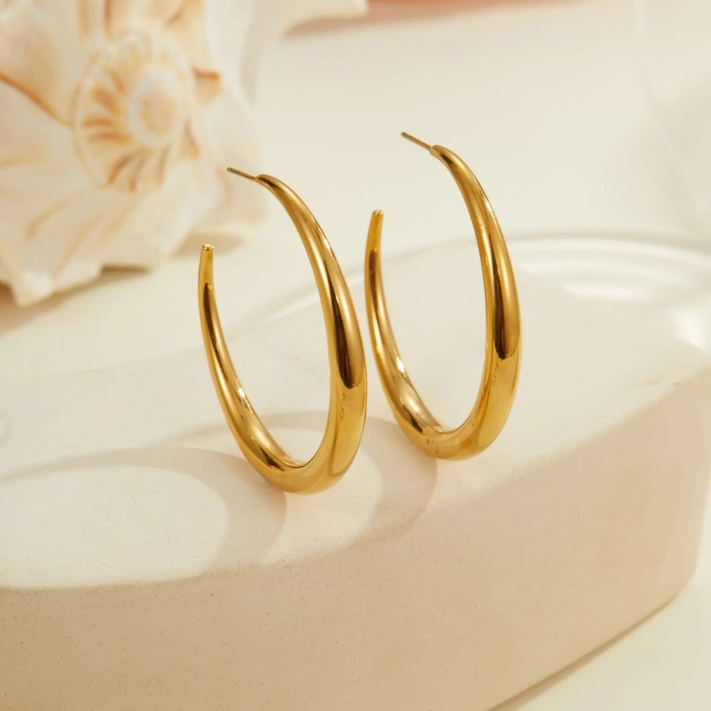 Titanium steel hoop earrings with 18K gold plating in large and small sizes