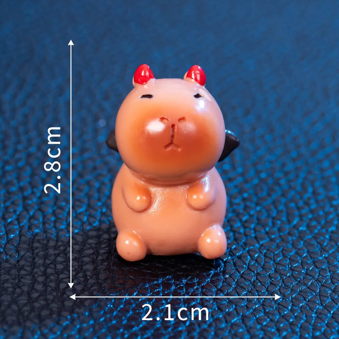 Halloween capybara resin figurine in one of eight designs like pumpkin or vampire.