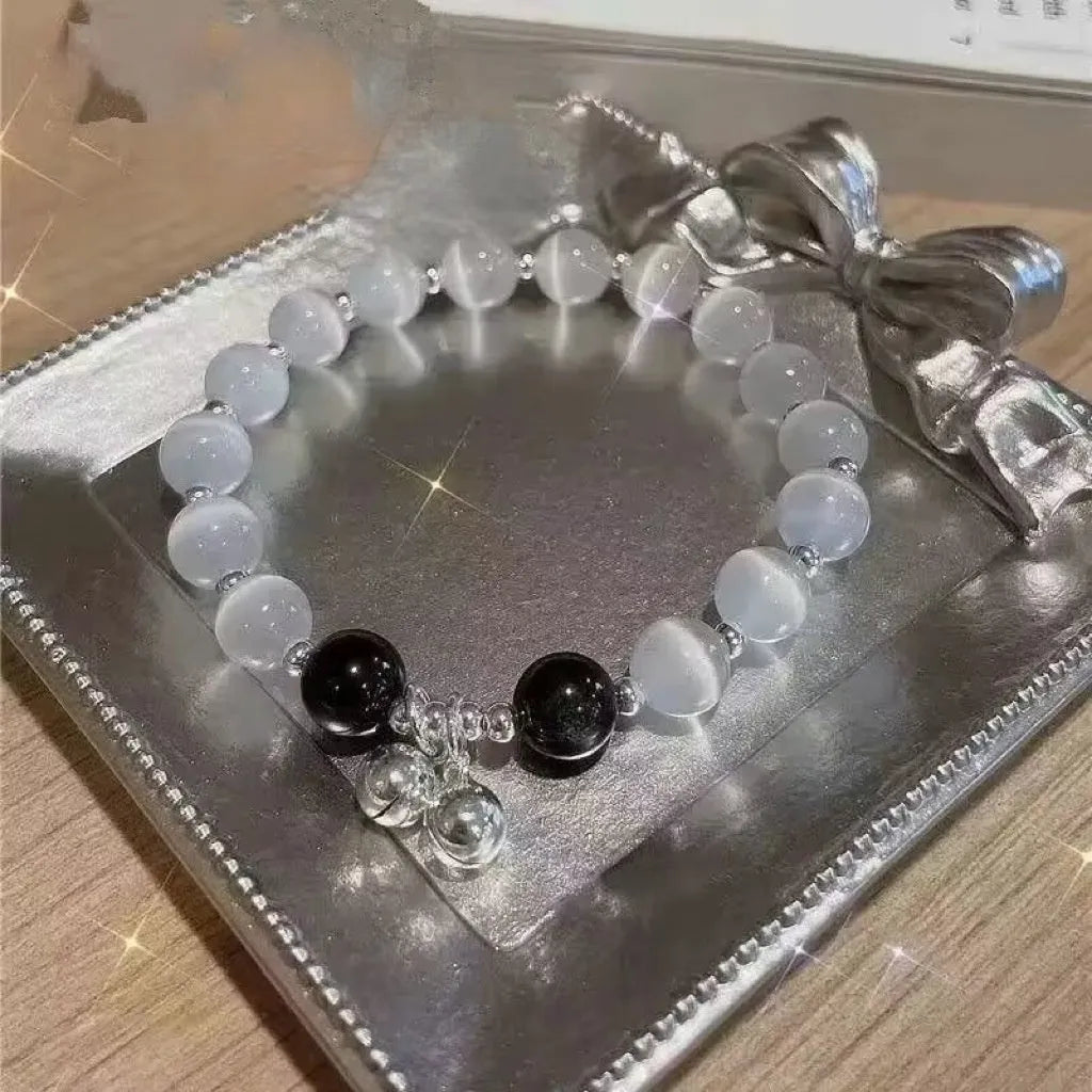 Glass bracelet with butterfly design and blessing card beads in moonlight colours