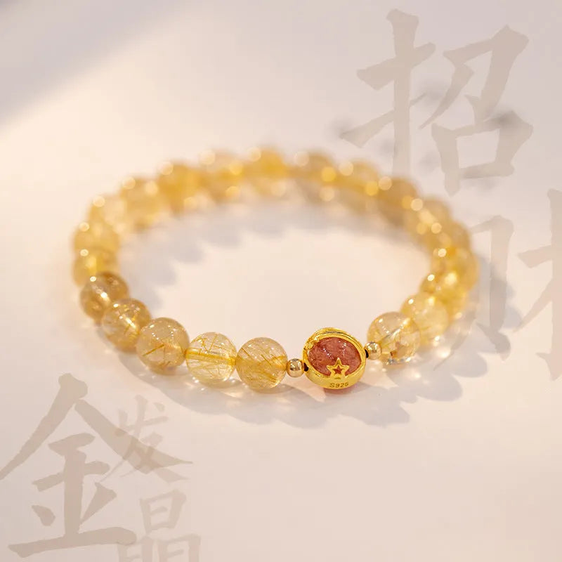 Gold rutilated quartz bracelet with diamond-cut beads in two size options
