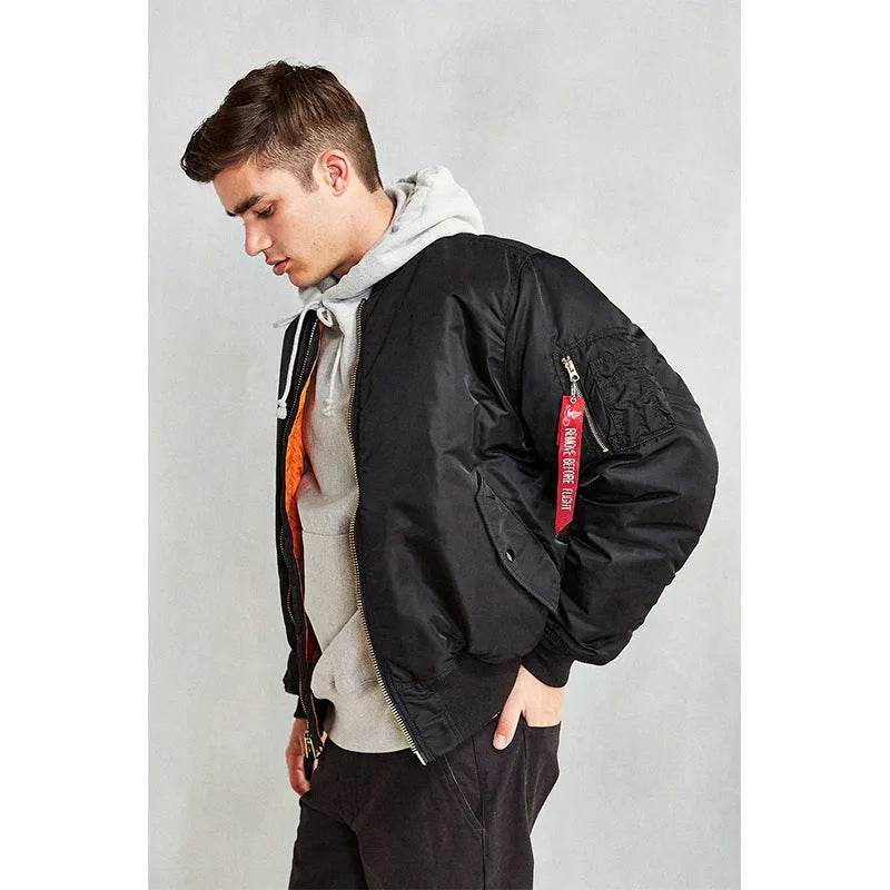 Men's loose fit army green cotton-padded pilot jacket on a hanger.