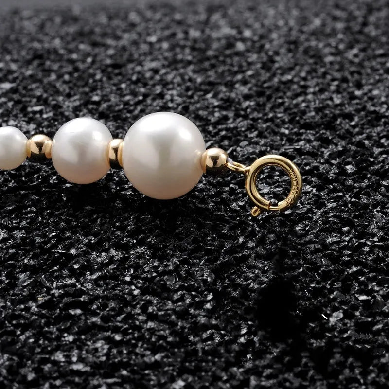 14K gold-plated natural pearl shell separated bead patchwork bracelet necklace unisex hip-hop style on display