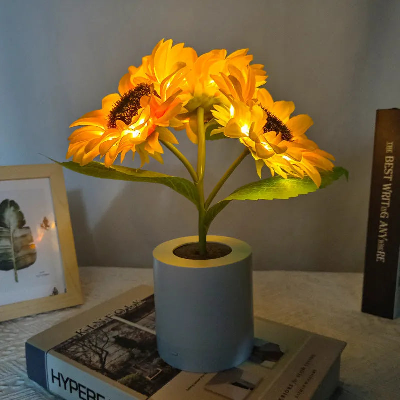 USB rechargeable artificial sunflower LED night light on table with decorative flower design