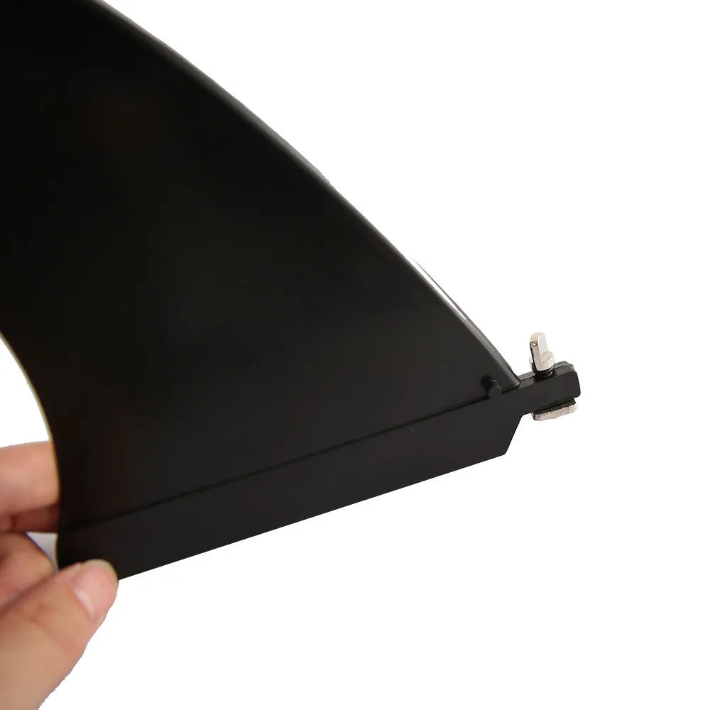 Heytur plastic SUP paddle with removable fish fin attachment on blade.