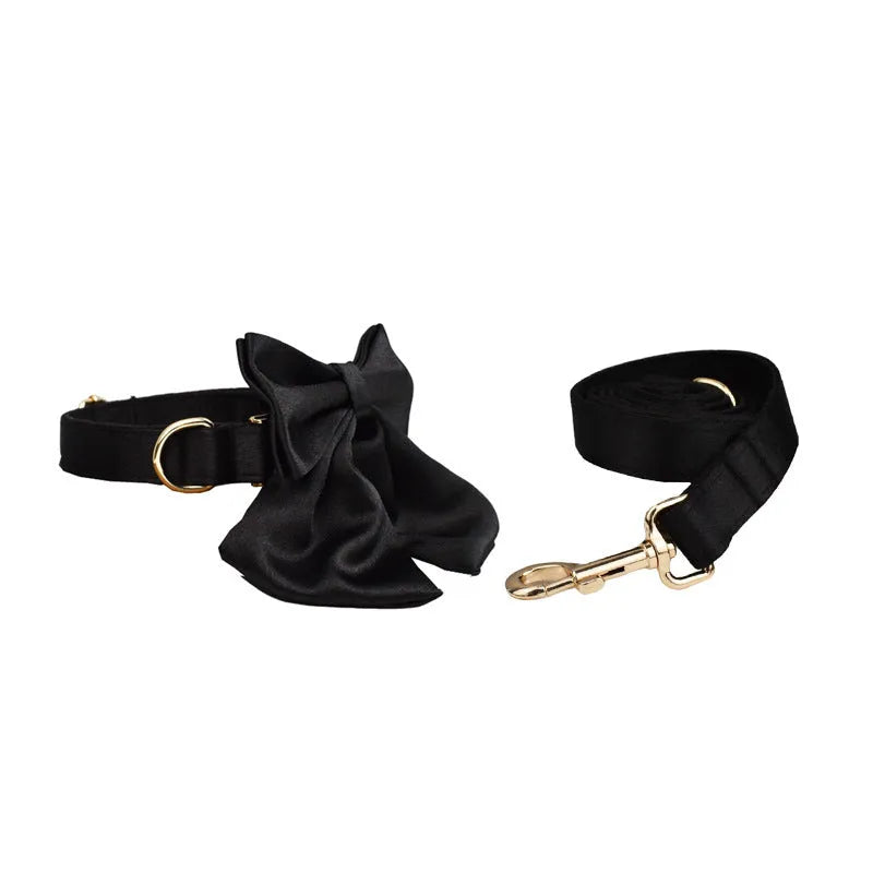 Dog harness and leash set with adjustable chest strap, matching bow, and vest accessories in fabric construction