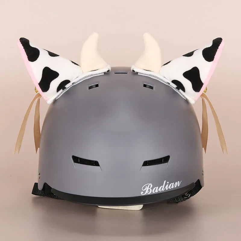 A soft plush cartoon character helmet cover for ears, shown in M size.