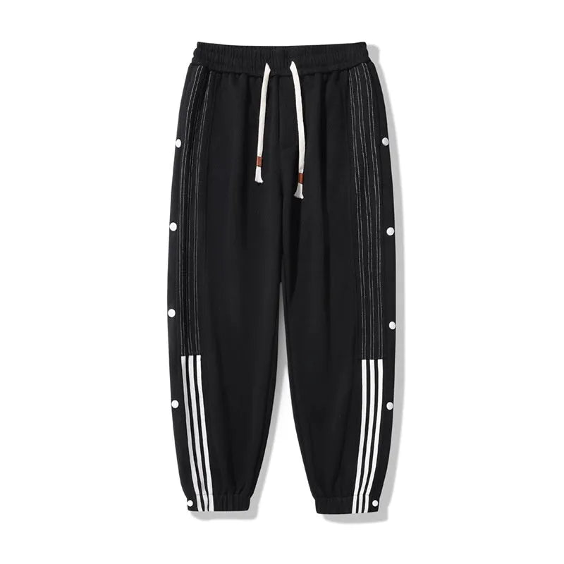 Men's loose fit sweatpants with ankle-tied cuffs in cotton blend fabric