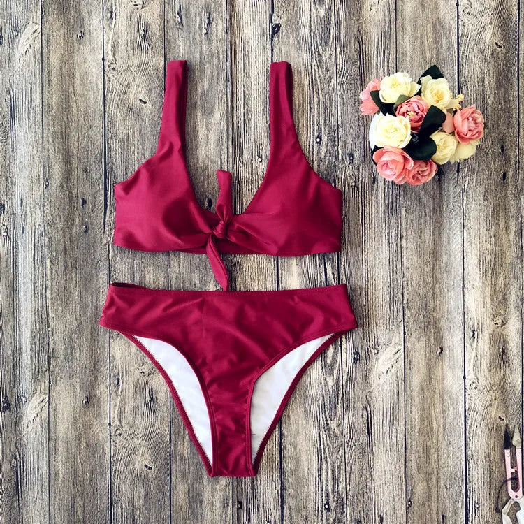 Women's solid colour bikini set with sleeveless top and matching briefs in polyester fabric