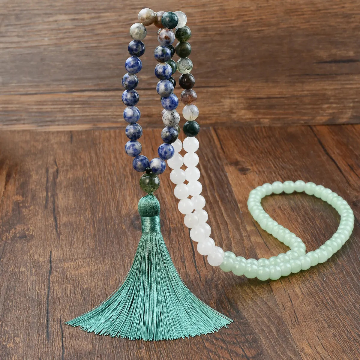 Long beaded bohemian necklace with 108 natural stones, a geometric pendant, and colourful tassels on an 81cm chain.