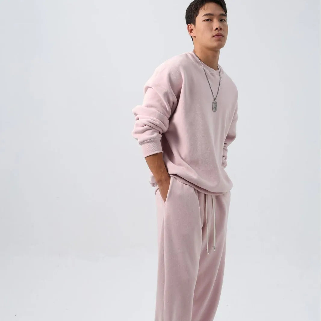 Men's polar fleece suit set showing crew neck jacket and padded trousers in five winter colour options