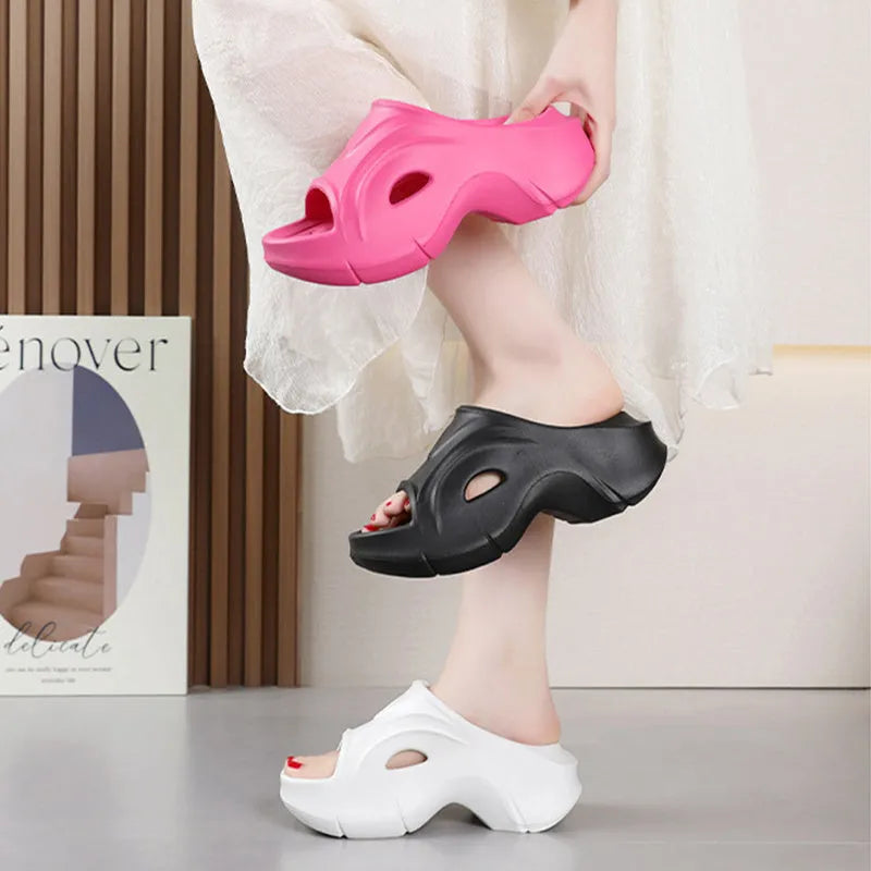 Women's thick-soled EVA slippers in white, black, or rose red with round toe design