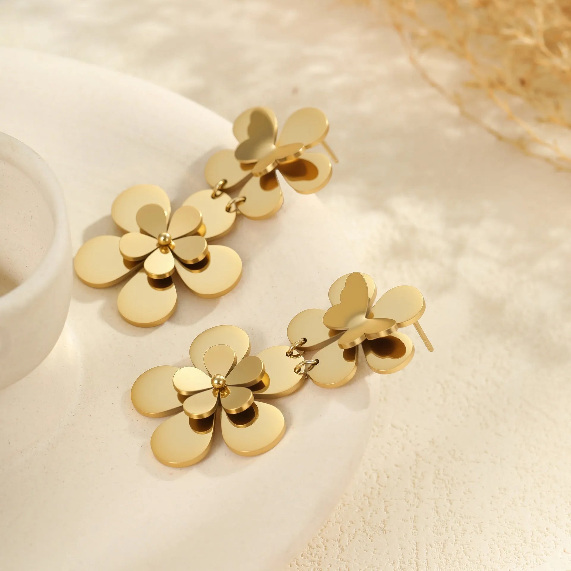 Gold electroplated stainless steel earrings with floral butterfly design for women