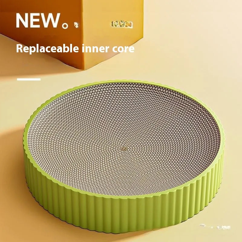 Green round cat scratching board with corrugated paper surface measuring 55cm diameter