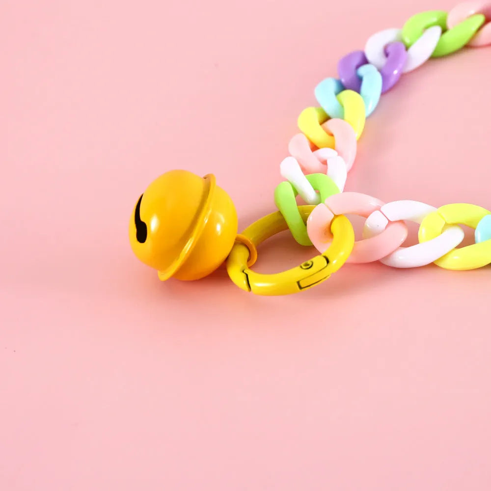 Macaron candy colour plastic pet collar on white background showing chain blue, pink and mixed colour options
