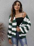 Blue and black striped women's cardigan sweater with button front and regular sleeves.