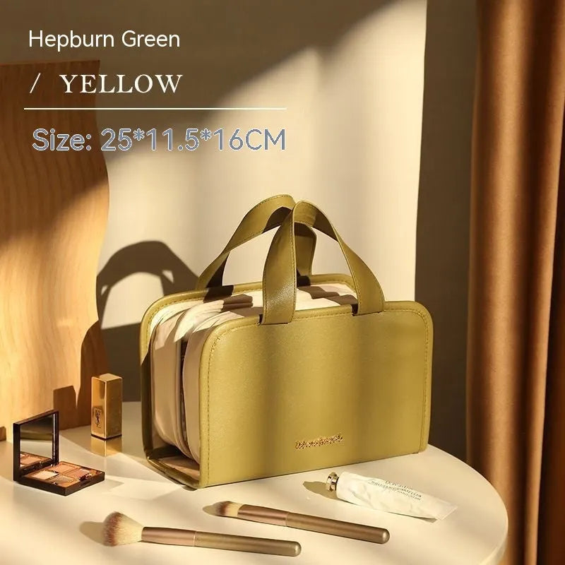Large capacity leather book cosmetic bag in sunset yellow, open to show interior, with imitation leather finish.