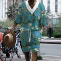 Peacock blue men's 3D printed knitted casual suit with T-shirt top and matching shorts.