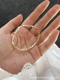 Women's 14K gilded purple silver bracelet with irregular natural pearls and matching necklace.