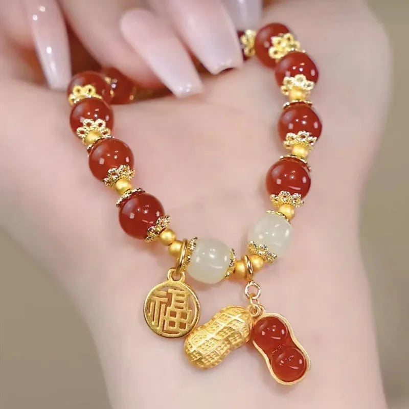 Chinese style glass bead bracelet with bamboo leaf design and manual craftsmanship details.