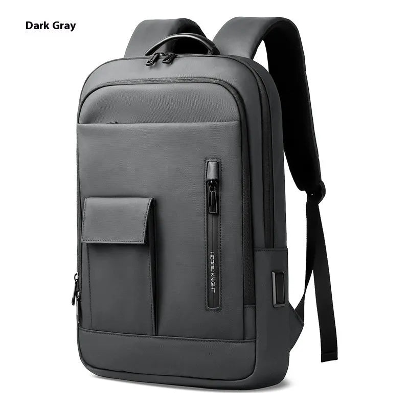 Lightweight Oxford cloth men's backpack in dark grey with sewing line details, shown from the side.