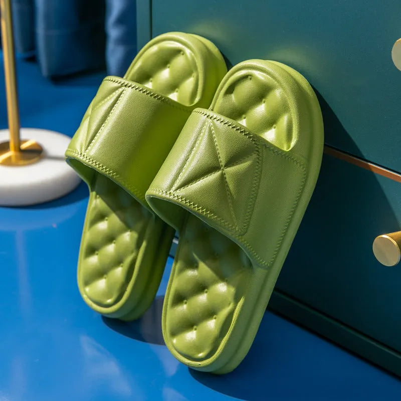 A pair of thick-soled EVA foam bath sandals in a chosen colour, showing the non-slip sole pattern.