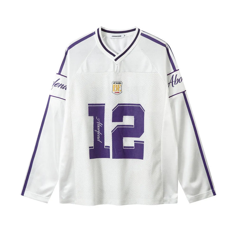 Digital printed long-sleeved V-neck t-shirt in polyester jersey fabric, loose fit with contrast colour detailing