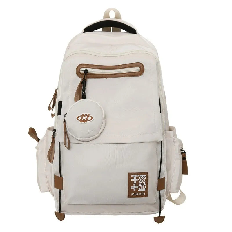 Large-capacity nylon backpack for middle school students with curved shoulder straps in multiple colours
