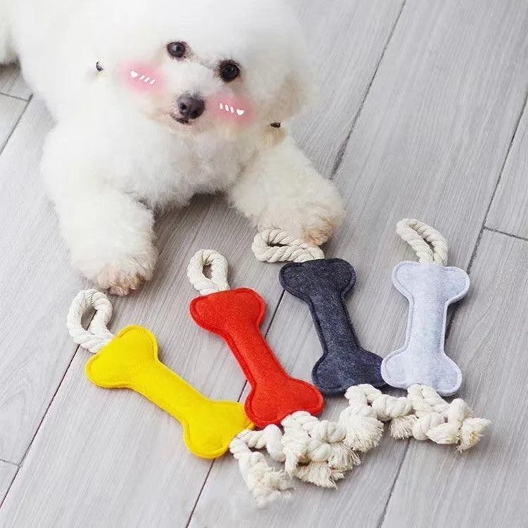 Bone shaped dog rope toy with felt exterior in four colour options