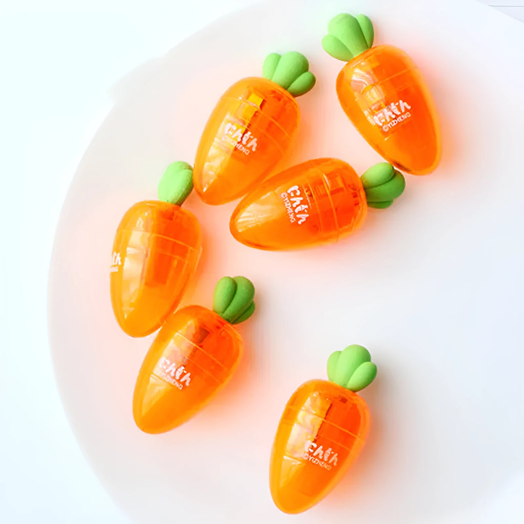 Cartoon carrot pencil sharpener with plastic shell, 7cm full length, 4cm blade, and carrot colour.