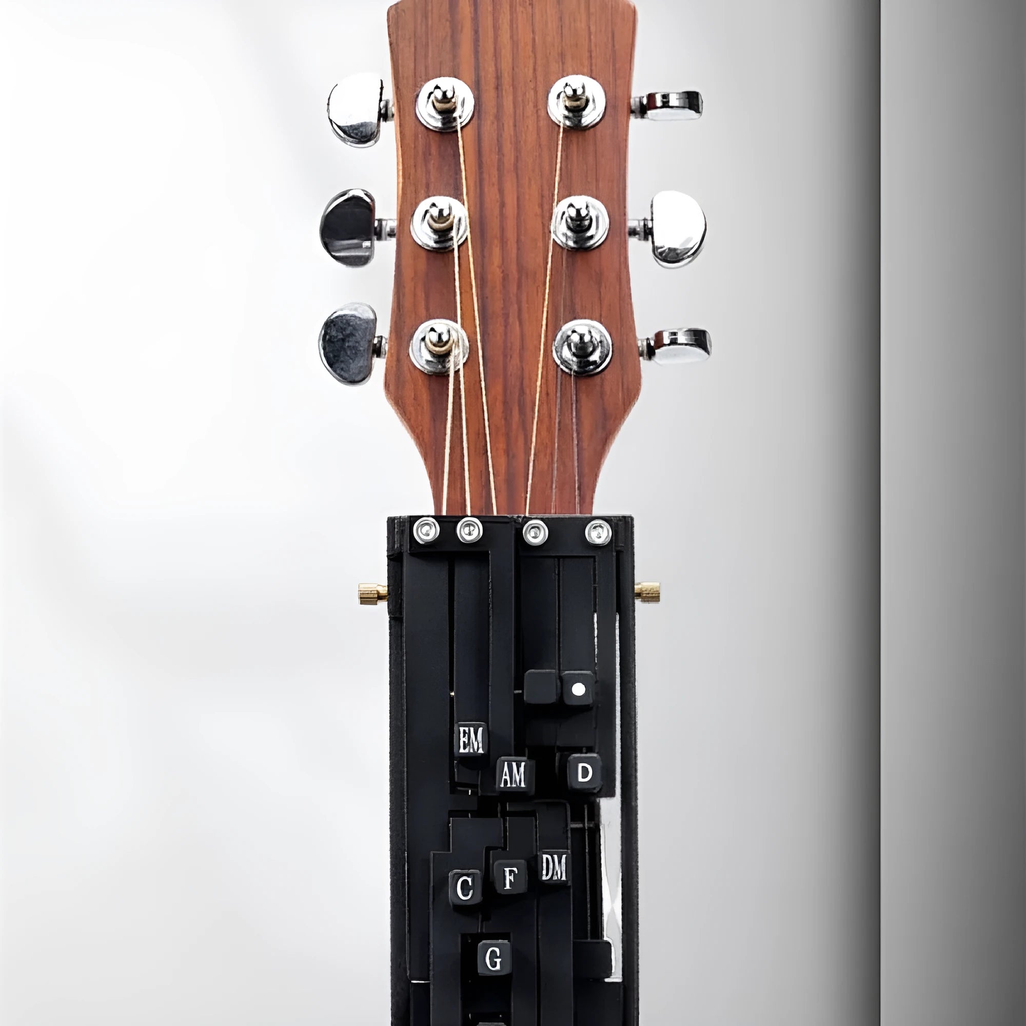 Automatic guitar chord practice device for beginners in black and white colour options