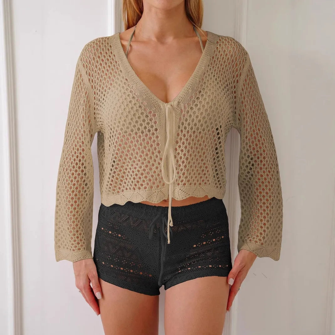 Women's apricot hollow woven cardigan blouse with bell sleeves, shown front view.