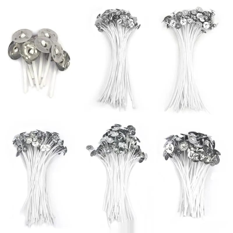 White cotton candle wicks for DIY candle making in three length options on craft background