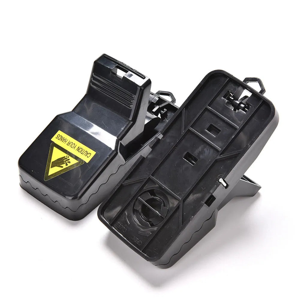 Six black plastic snapping mousetraps with measurements 11cm long by 5.5cm high