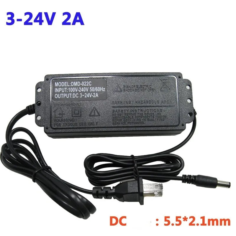 Compact black adjustable power adapter with LED digital display showing voltage output on a white background